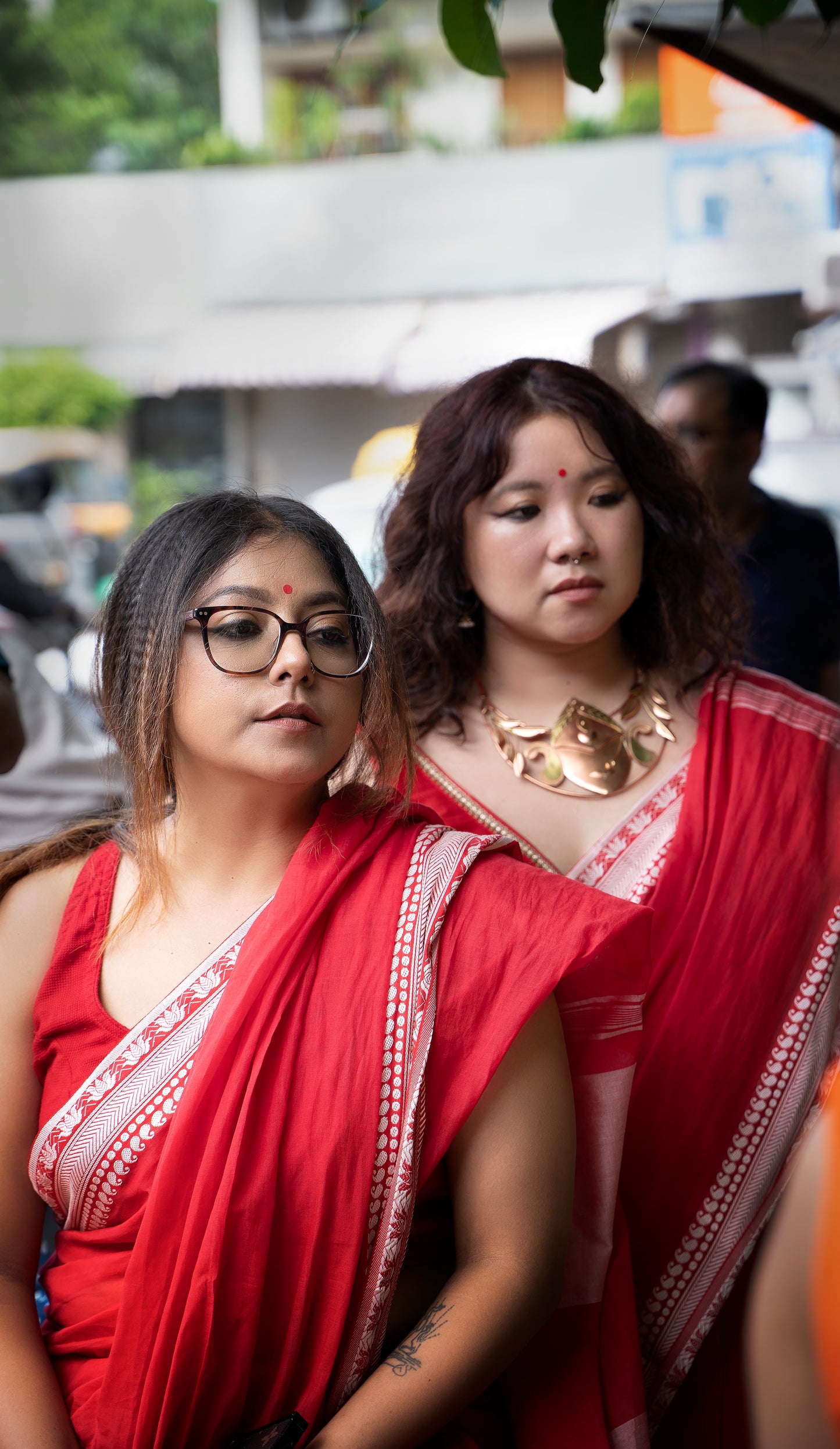 Devii Saree – Red premium cotton with lotus & paisley border, honoring everyday women