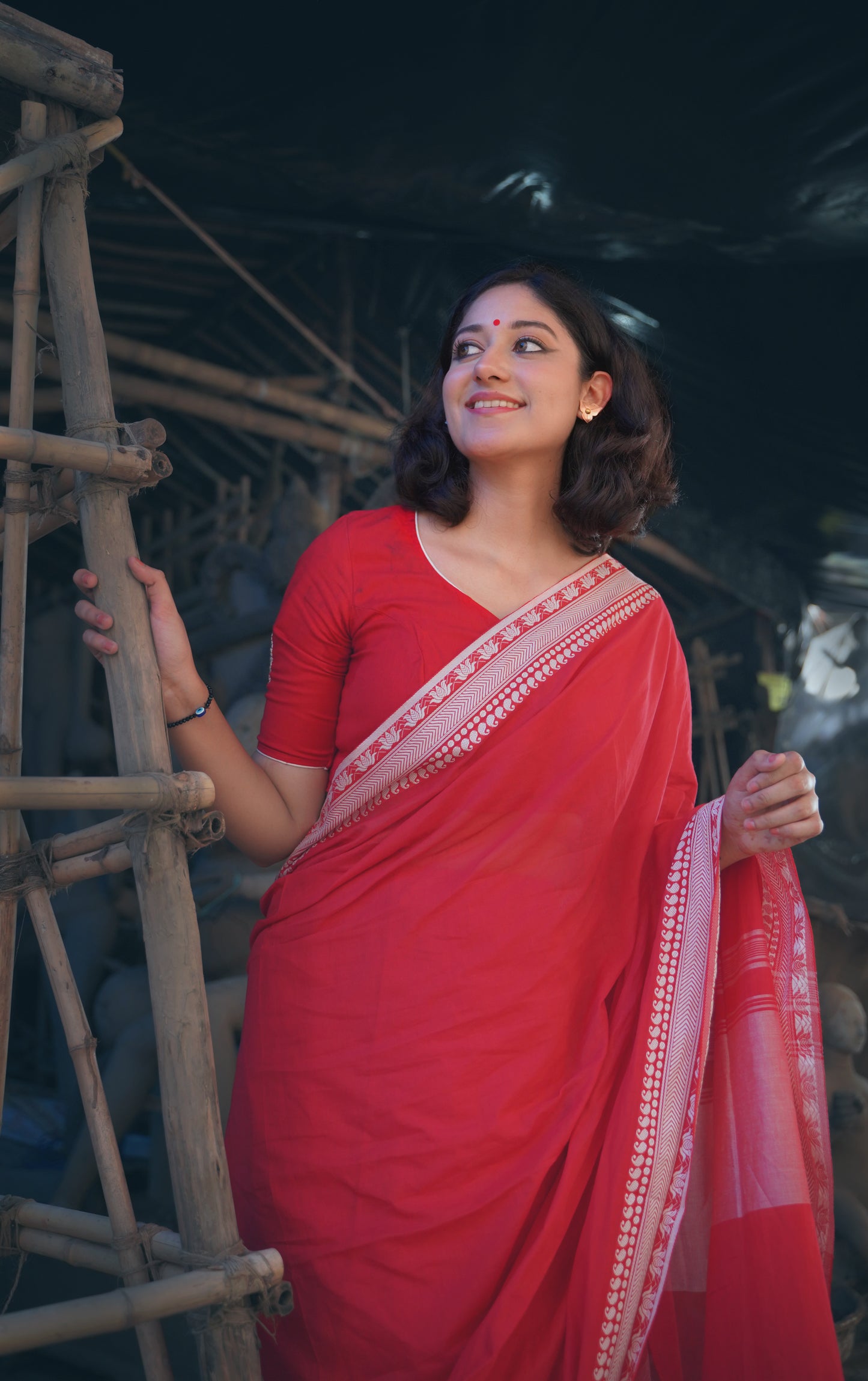 Devii Saree – Red premium cotton with lotus & paisley border, honoring everyday women