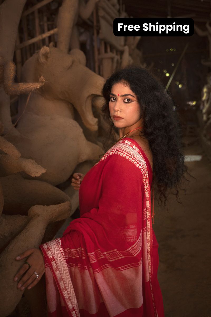 Devii Saree – Red premium cotton with lotus & paisley border, honoring everyday women