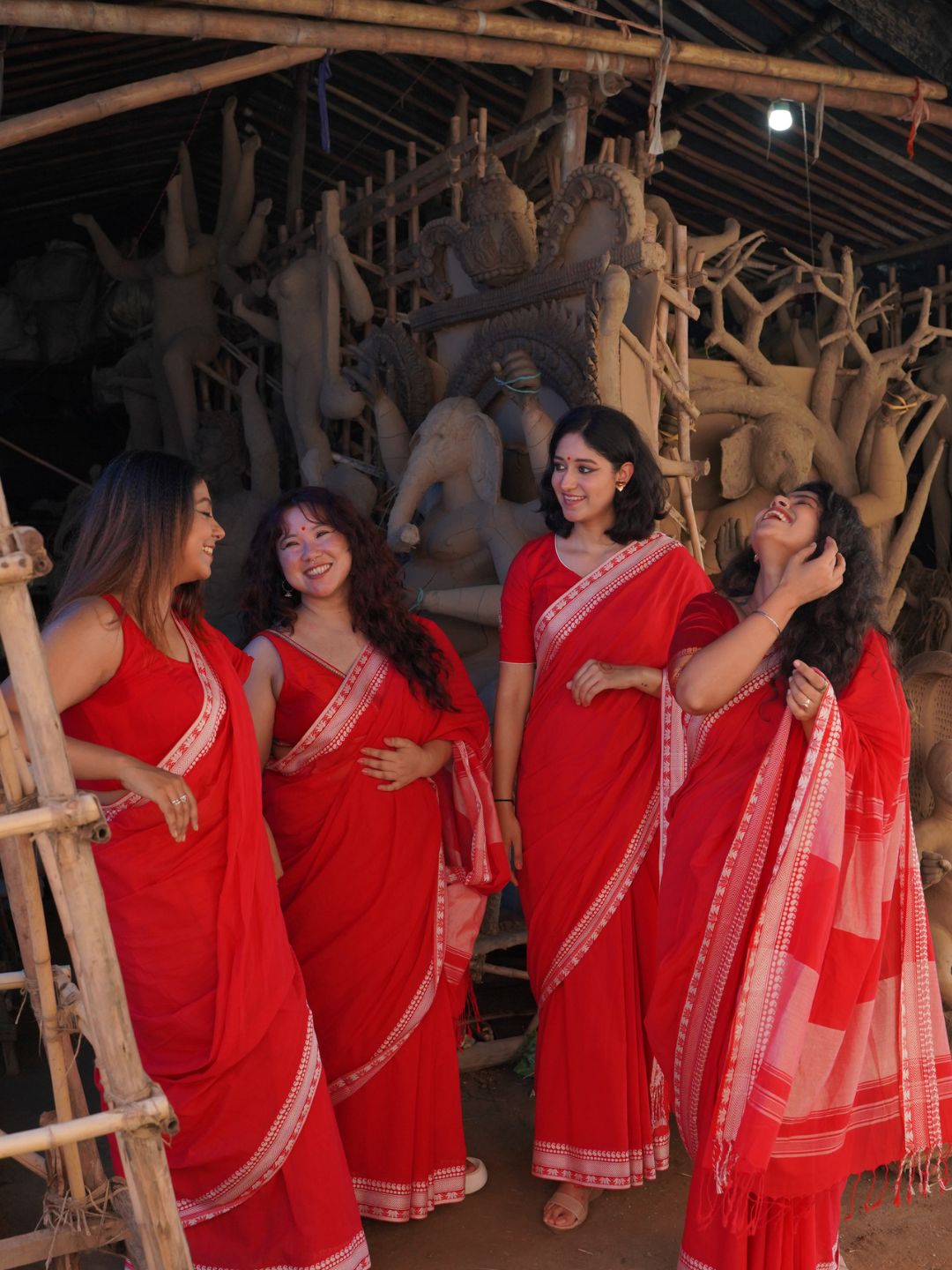 Devii Saree – Red premium cotton with lotus & paisley border, honoring everyday women